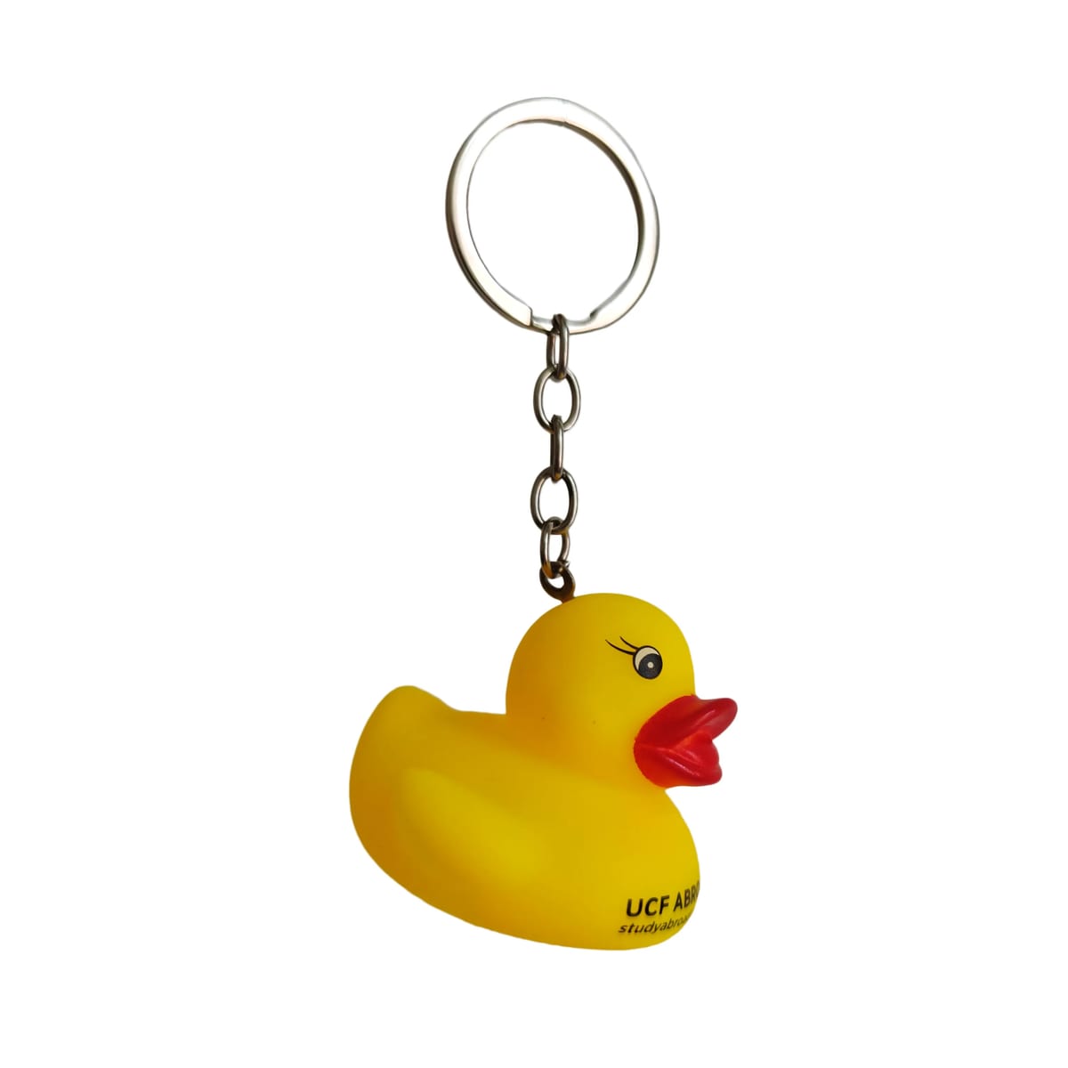 Playful Cartoon Yellow Duck Soft Rubber Keychain Accessory — image 1 of 11